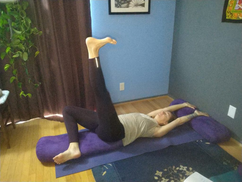 Danielle practicing yoga